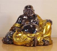 Guld buddha figur 17 cm høj.